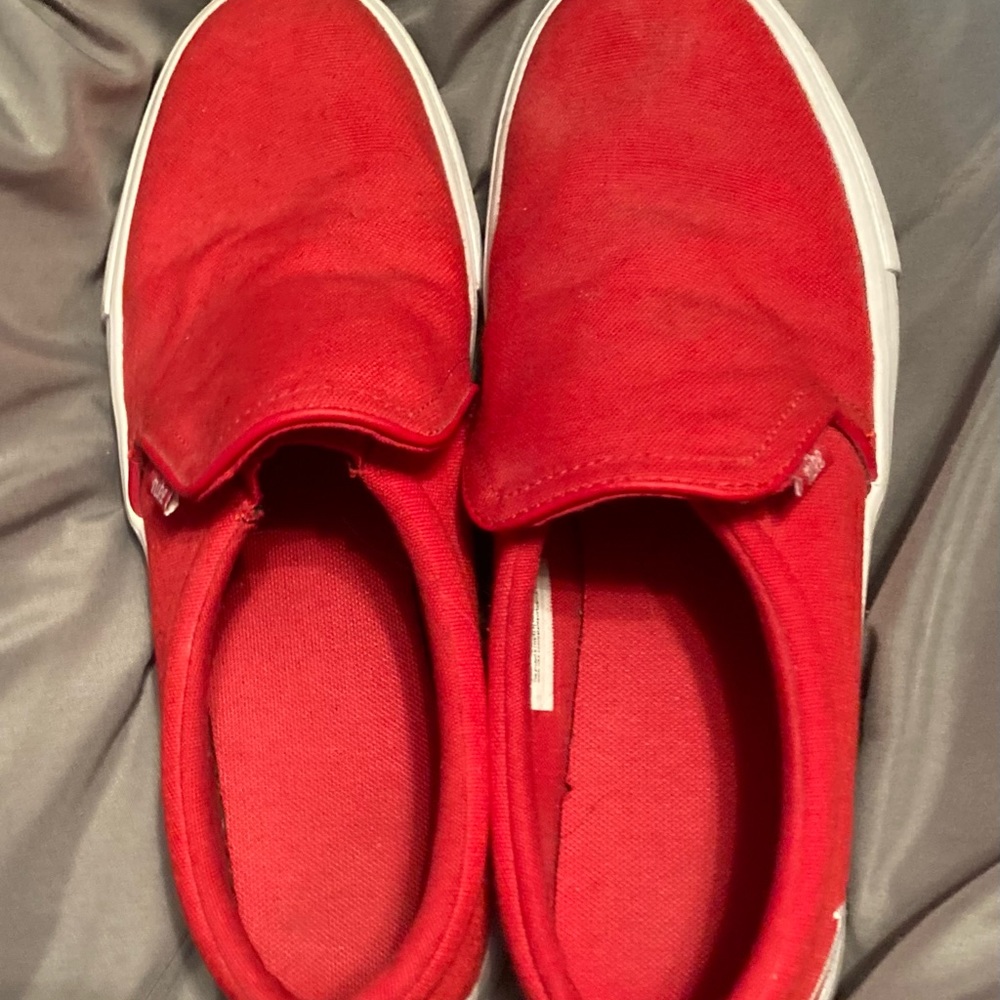 Red Nike slide tennis shoes